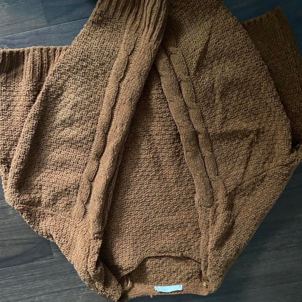 Plush short sweater, with cute knitted design on sleeves. So comfy!